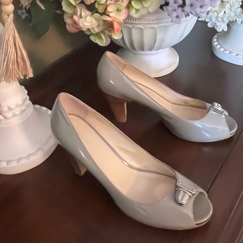 COACH Grey Patent Peep Toe with wood heel and silver buckle at peep.